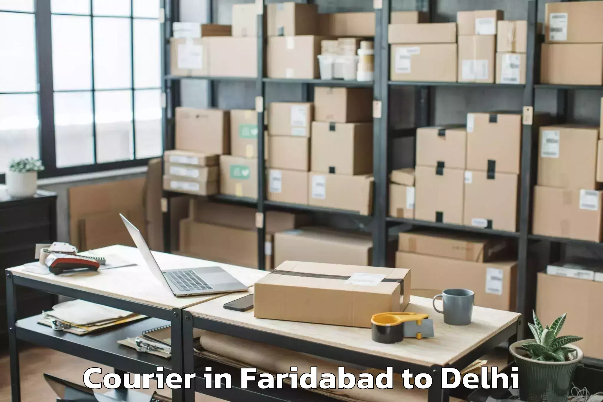 Book Faridabad to Model Town Courier Online